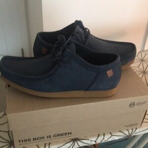 Navy blue Clarks Walabees
